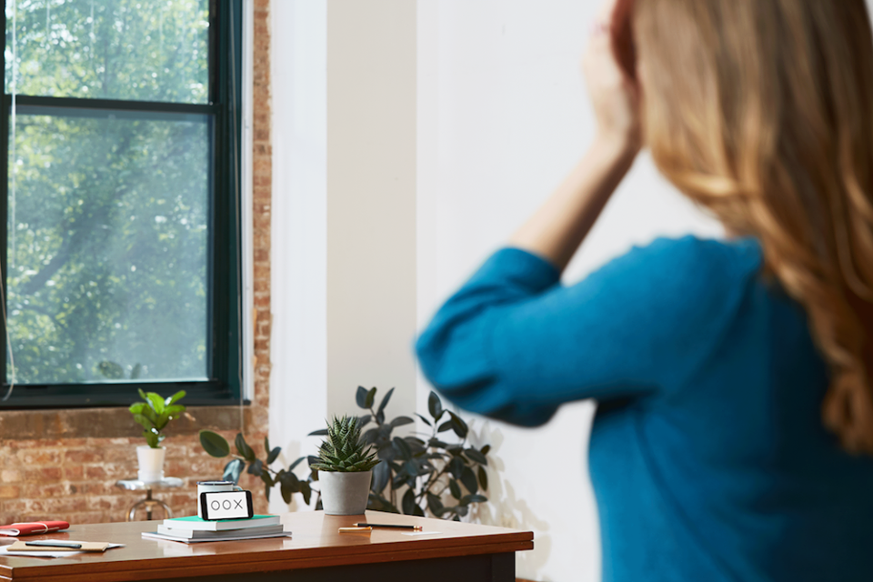 Woman taking Opternative test on mobile